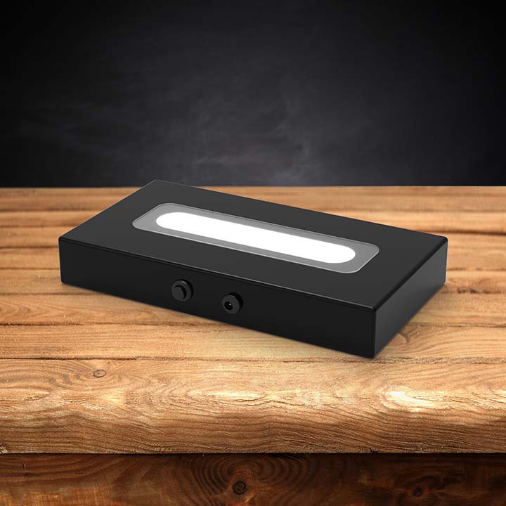 Wood LED light base with a dark background