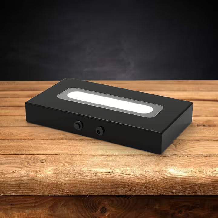 Wood LED light base with a dark background