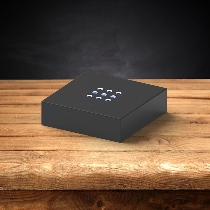 A plastic black light base for 3D photo crystals