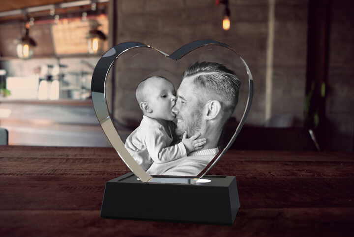 3D photo crystal heart with an image of a loving father and baby engraved inside.