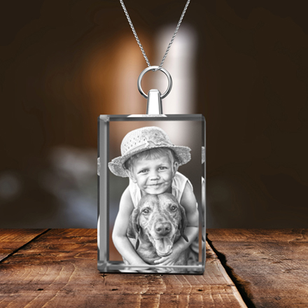 Picture of a kid and his dog engraved inside a 2D photo crystal rectangle necklace